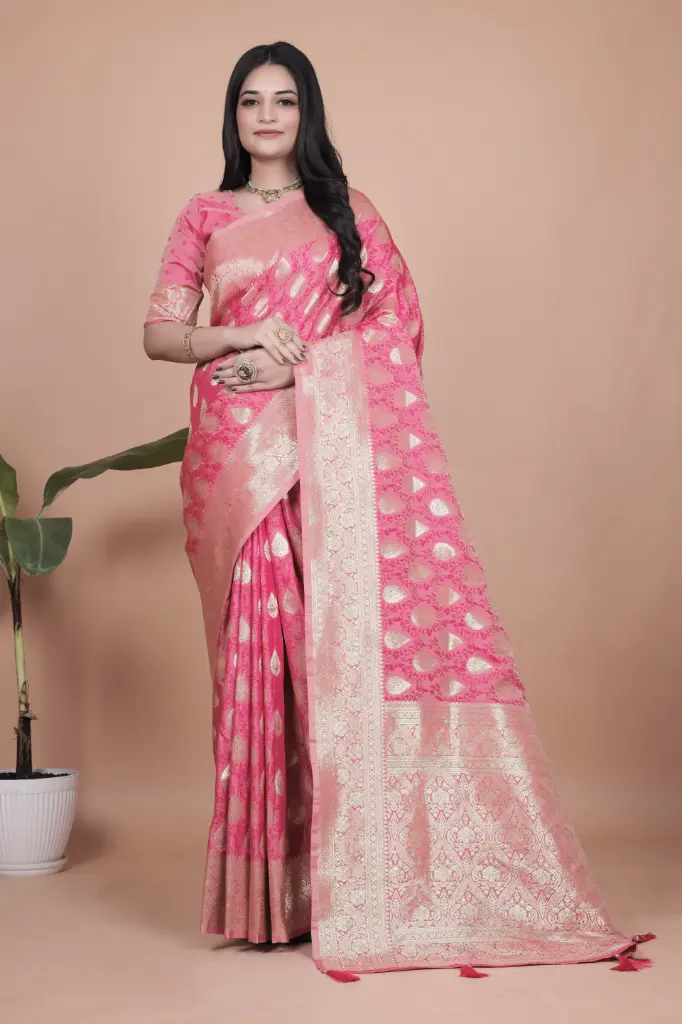 Fabric: Premium BanarasiDesign: All-over Intricate Weaving with Elegant Pallu and Border Silk