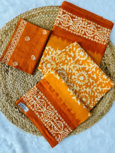 Fabric: Pure Mul Mul Cotton – soft, breathable & skin-friendly  ✨Print: Traditional Wax Batik Print – handcrafted for an authentic look  ✨Saree Cut: 6.30 meters (including blouse piece)  Blouse: Matching blouse fabric included